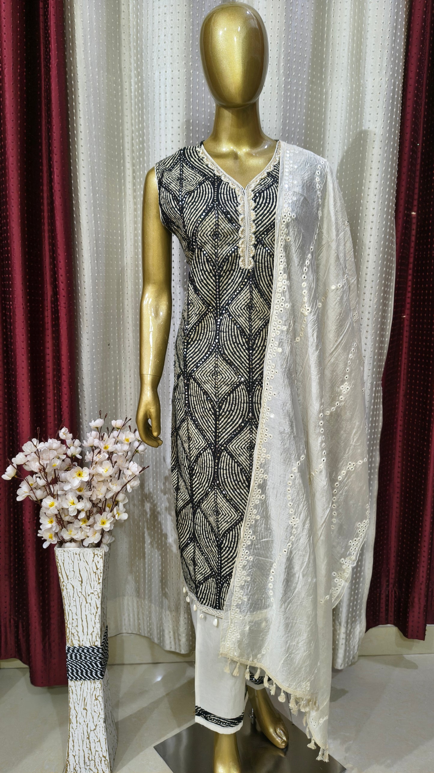 Beautiful Party Wear Set Floral Printed with Cowrie Latkan and full Mirror Embroidery and Rivet Moti with Dupatta